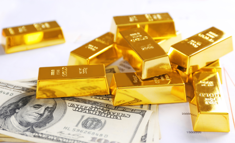 Ouro e prata caem com fortalecimento do dólar